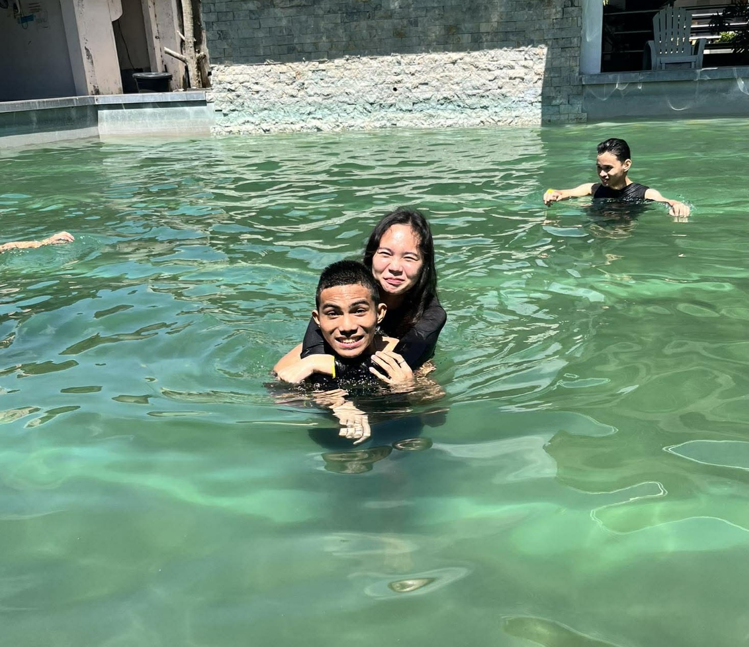 CJ and Elaine swimming